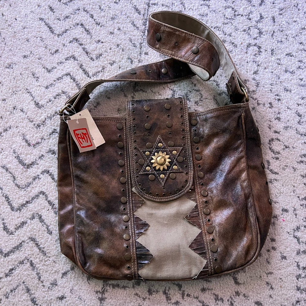 Far Horizons Trader genuine leather canvas bag